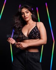 Daring Shivangi Verma Cleavage in a Black Sequin Deep V Triangle Halter Bra Top Black Baggy Cargo Pants Photos 02