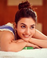 Dreamy Actress Vidhi Yadav in a Blue Striped Lace Trim Sundress Photos 02