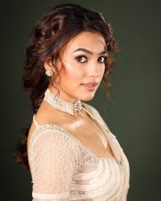 Elegant Actress Vidhi Yadav in a Cream Embroidered Lehenga Photos 02