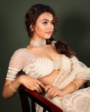 Elegant Actress Vidhi Yadav in a Cream Embroidered Lehenga Photos 09