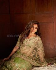 Enigmatic Actress Rasha Thadani in a Olive Green Embroidered Lehenga Set Photos 09