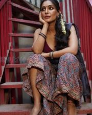 Enigmatic Actress Shivangi Verma in a Maroon Blouse and Printed Saree Photos 02