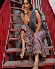 Enigmatic Actress Shivangi Verma in a Maroon Blouse and Printed Saree Photos 03