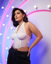 Glam Shivangi Verma in a White Sleeveless Halter Corset Top with a High Waisted Black Pants 01