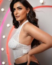 Glam Shivangi Verma in a White Sleeveless Halter Corset Top with a High Waisted Black Pants 02
