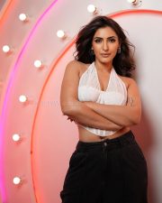 Glam Shivangi Verma in a White Sleeveless Halter Corset Top with a High Waisted Black Pants 04