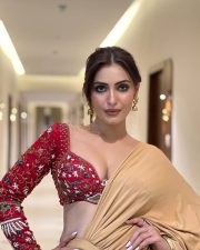 Glamorous Actress Shivangi Verma in a Beige Saree With Red Blouse Photos 02