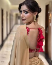 Glamorous Actress Shivangi Verma in a Beige Saree With Red Blouse Photos 04