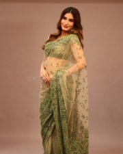 Gorgeous Rasha Thadani in a Transparent Green Saree with a Matching Sleeveless Blouse Photos 04