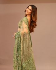 Gorgeous Rasha Thadani in a Transparent Green Saree with a Matching Sleeveless Blouse Photos 05