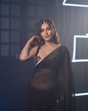 Hot Item Song Dancer Shivangi Verma in a Black Sheer Saree with a Black Lace Bralette Photos 08