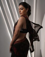 Hot Shivangi Verma in a Black Red Floral Saree with a Black Lace Bustier Style Sleeveless Blouse Photos 08