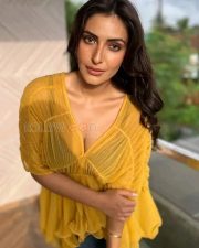 Indian Television Actress Shivangi Verma in a Yellow See Through Top with a Black Bra Photos 04