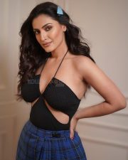 Pretty Shivangi Verma in a Black Halter Neck Cut Out Crop Top with a Mini Blue Skirt Photos 01