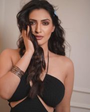 Pretty Shivangi Verma in a Black Halter Neck Cut Out Crop Top with a Mini Blue Skirt Photos 02