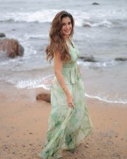 Radiant Actress Rasha Thadani in a Mint Green Floral Backless Halter Dress Photos 01