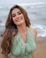 Radiant Actress Rasha Thadani in a Mint Green Floral Backless Halter Dress Photos 02