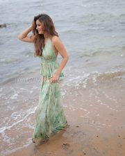Radiant Actress Rasha Thadani in a Mint Green Floral Backless Halter Dress Photos 04