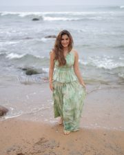 Radiant Actress Rasha Thadani in a Mint Green Floral Backless Halter Dress Photos 05