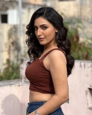 Sexy Shivangi Verma in a Sleeveless Brown Crop Top and Blue Jeans Photos 01