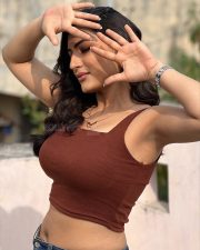 Sexy Shivangi Verma in a Sleeveless Brown Crop Top and Blue Jeans Photos 04