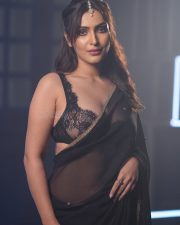 Sophisticated Actress Shivangi Verma in a black lace saree with embellished blouse photos 04