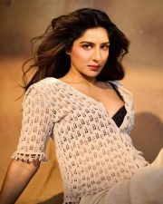 Bai Ga Actress Neha Khan in a Cream Open Knit Cardigan with a Black Polka Dot Bralette and High Waisted Trousers Photos 08