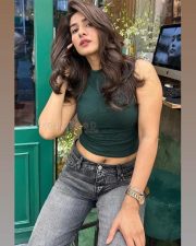 Bai Ga Actress Neha Khan in a Green Crop Top and Grey Jeans Photos 04