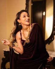 Bhanupriya Bhooter Hotel Actress Mimi Chakraborty in a Deep Wine Colored Velvet Saree with a Sleeveless Velvet Blouse Photos 03