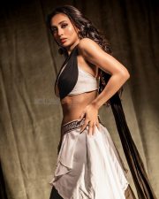 Bhanupriya Bhooter Hotel Actress Mimi Chakraborty in a Two Toned Halter Neck Wrap Top and White Asymmetrical Layered Skirt Pictures 05
