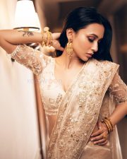 Dazzling Mimi Chakraborty in a Cream Designer Saree Photos 02