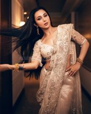 Dazzling Mimi Chakraborty in a Cream Designer Saree Photos 04