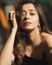 Glamorous Tina Datta in a Black Sleeveless Ruched Dress Photos 03