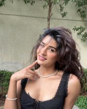 Sexy Marathi Actress Neha Khan in a Black Lace Corset Top with a White Skirt Photos 01