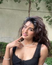 Sexy Marathi Actress Neha Khan in a Black Lace Corset Top with a White Skirt Photos 01