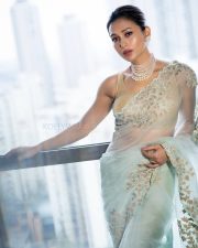 Stunning Mimi Chakraborty in a Transparent Saree with Sleeveless Blouse Pictures 01