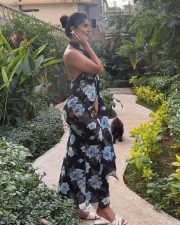 Sultry Neha Khan Cleavage in a Black Floral Halter Neck Maxi Dress Photos 03