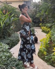 Sultry Neha Khan Cleavage in a Black Floral Halter Neck Maxi Dress Photos 03