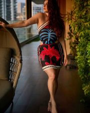 Bold Shivaleeka Oberoi in a Black and Blue Halter Neck Top with a Vibrant Floral Skirt Photos 02