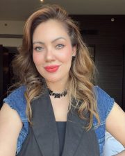 Charming Actress Munmun Dutta in a Black Top with Denim Vest Photos 04