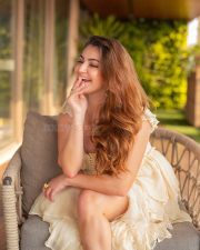 Indian Actress Shivaleeka Oberoi in a Cream Ruffle Maxi Dress with a Corset Bodice with a Thigh Slit Photos 03