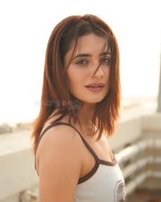 Petite Beauty Priyanka Rewri in a White Printed Tank Top and Black Mini Skirt Pictures 03