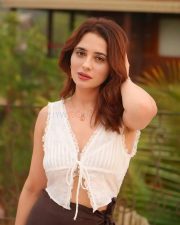 Sexy Hot Priyanka Rewri in a White Sleeveless Crop Top and Brown Tie Up Skirt Photos 02