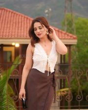 Sexy Hot Priyanka Rewri in a White Sleeveless Crop Top and Brown Tie Up Skirt Photos 04