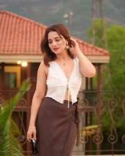 Sexy Hot Priyanka Rewri in a White Sleeveless Crop Top and Brown Tie Up Skirt Photos 04