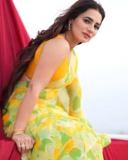 Sultry Beauty Priyanka Rewri in a Yellow Green Printed Saree with Sleeveless Blouse Photos 01