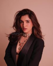 Anupamaa Actress Nidhi Shah in a Black Tuxedo Blazer with a Maroon Bralette and Light Denim Jeans Photos 01
