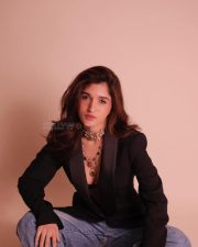 Anupamaa Actress Nidhi Shah in a Black Tuxedo Blazer with a Maroon Bralette and Light Denim Jeans Photos 05