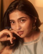 Bewitching Actress Mamitha Baiju in a Pale Blue Halter Neck Draped Top Photos 01