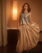 Bewitching Actress Mamitha Baiju in a Pale Blue Halter Neck Draped Top Photos 02